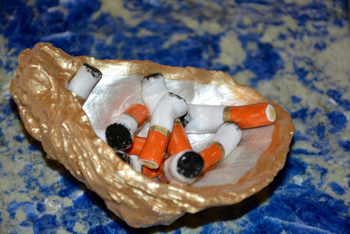 OYSTER SHELL CIGARETTE SCULPTURE - Knife Shift